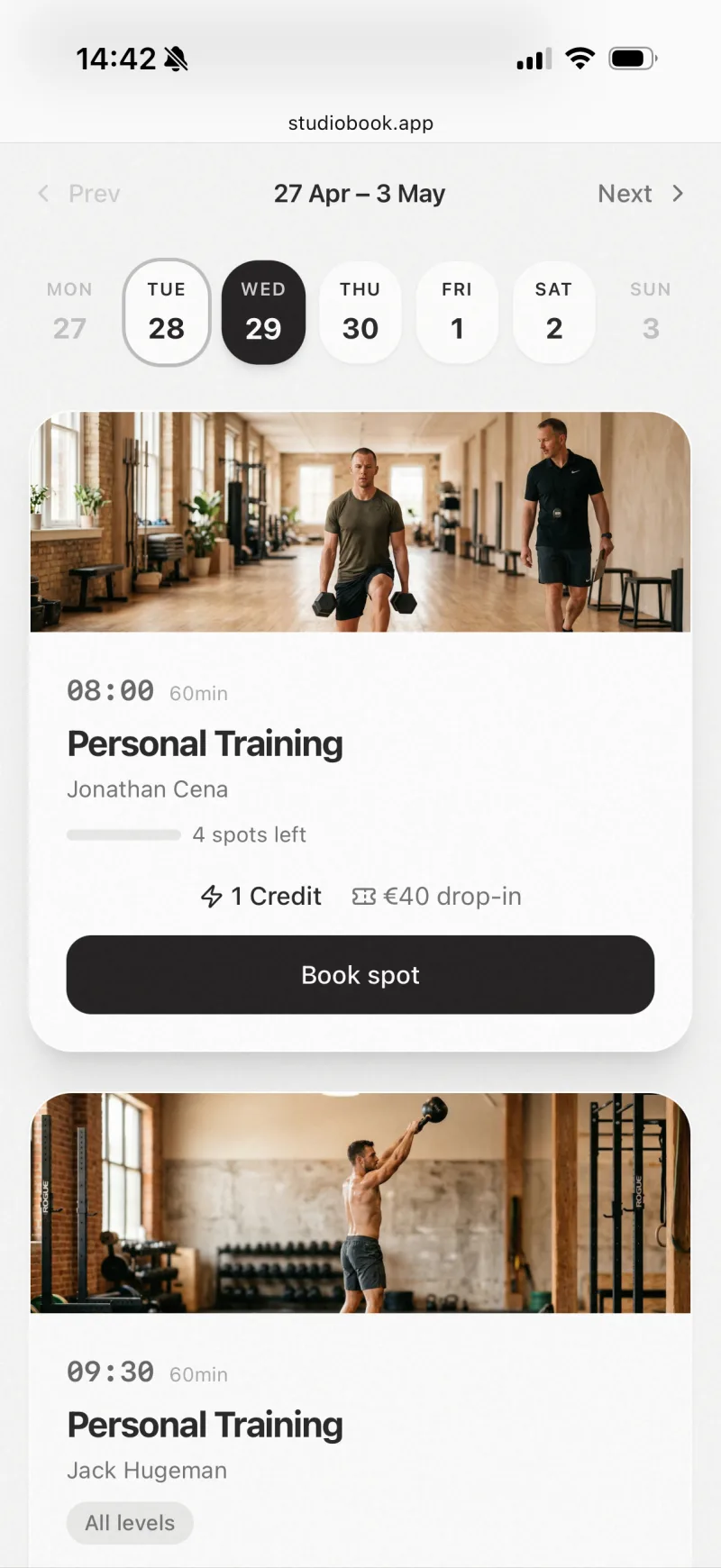 StudioBook booking page on a phone, showing the week's classes with available spots and a Book spot button.